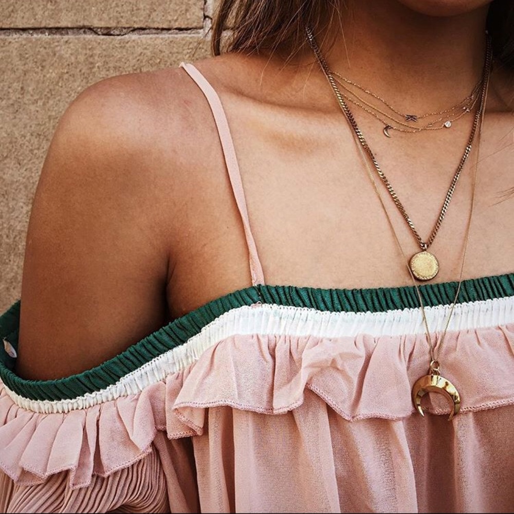 Storets top with pleated sleeves